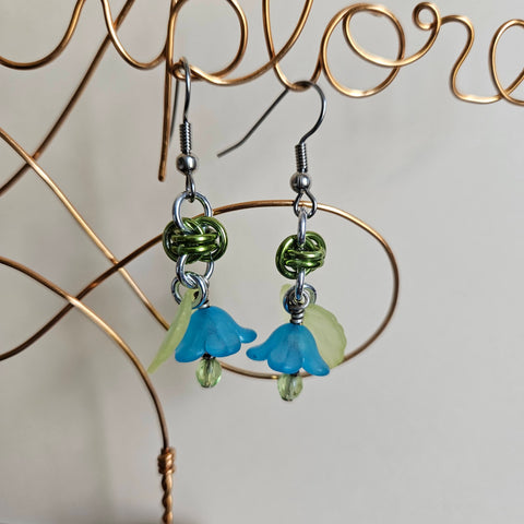 Spring Meadow Blossom Earrings - Blue Lucite Flower with Dangling Bright Green Crystal and Lime Green Barrel Chain Maille